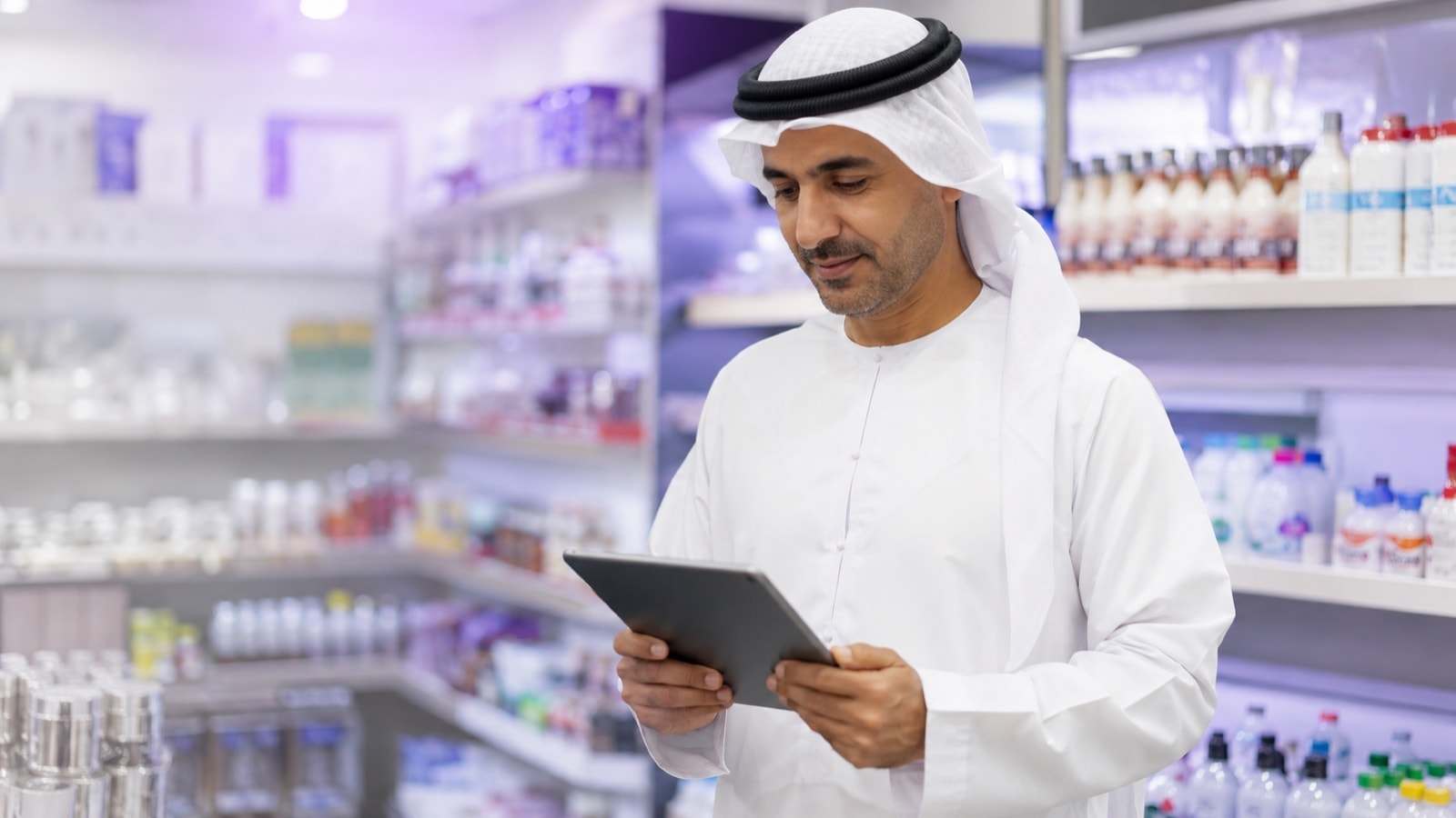 A trading shop owner managing his store on Raad ERP